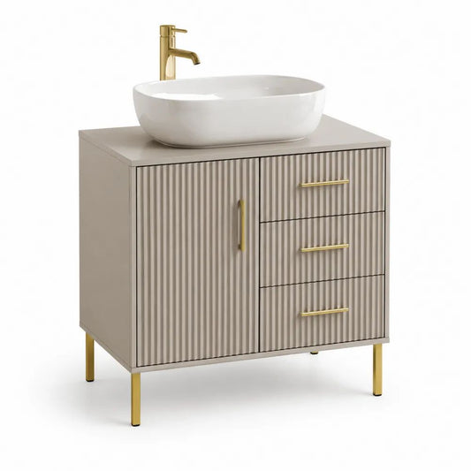 Meuble sous-vasque sur pieds en MDF taupe et métal doré, façade cannelée, 3 tiroirs et 1 porte, 80 × 45 × 80 cm
